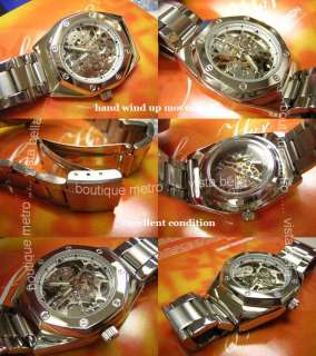 Transparent dial hand wind up steel watch  