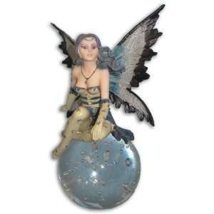  Black and Blue Fairy Sitting on Glass Ball