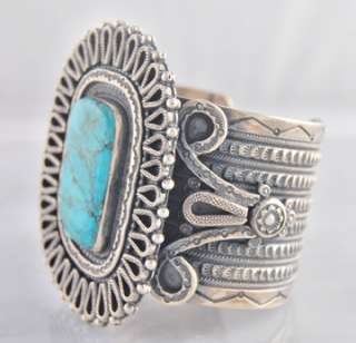 Description: Sterling Silver Turquoise Bracelet. Accenting the 