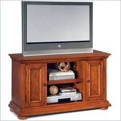   warm oak finish 207822 the home styles homestead tv stand in a rich