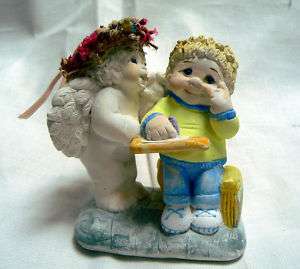 Dreamsicle Angel Figurine Intervention 1996  