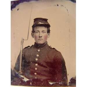   soldier in Union uniform with bayoneted musket