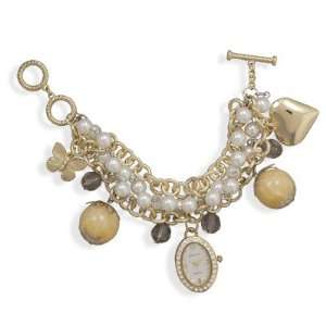  8+1 Gold Tone Fashion Charm Toggle Watch: Jewelry