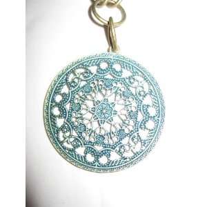   Turquoise Colored Medallion Necklace antique gold look chain: Beauty
