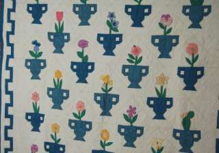 This BEAUTIFUL cotton 30s floral urn quilt is hand appliqued and hand 