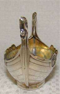   cellar this salt dish is made out of solid silver with a liner on the