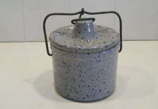 nice item here, a blue speckled pottery crock or jar with its own 