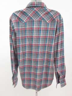   on a J.A.C.K.S. Pink Teal Plaid Flannel Long Sleeve Shirt size medium