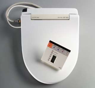 Elongated front Washlet toilet seat with cover.
