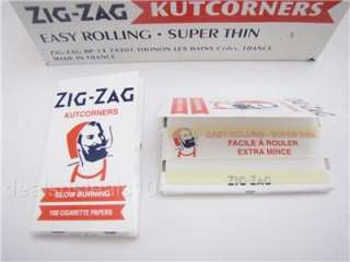 25 BOX ZIG ZAG WHITE KUTCORNERS SLOW BURNING ROLLING PAPERS 100 LEAVES 